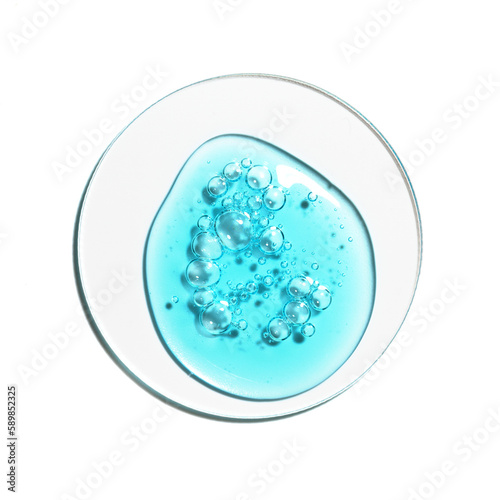 Texture swatch of blue hyaluronic acid serum gel on white isolated background, macro. Detergent, cosmetics, laboratory. A round drop in a petri dish