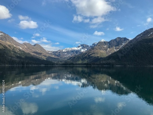 Fototapeta Naklejka Na Ścianę i Meble -  Snowy mountains reflected on the lake, Homer, Alaska