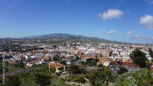 Panoramic view of San Cristonal de La Laguna from San Roque viewing point on a spring sunny day in Tenerife, Canary Islands, Spain  © Anna