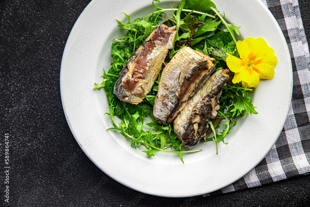 salad sardine fresh green leaves  seafood snack meal food on the table copy space food background rustic top view  