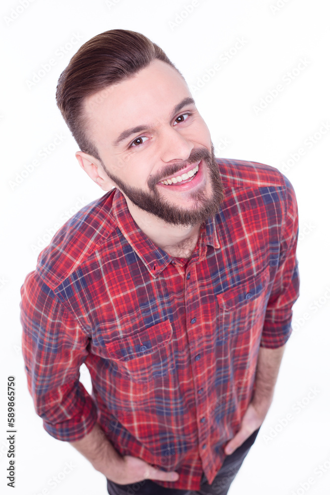 Strong, confident, handsome and bearded man in casual checkered shirt is posing isolated on white background with copy space for text and advertising Strong, confident, handsome and bearded man in casual checkered shirt is posing isolated on white background with copy space for text and advertising