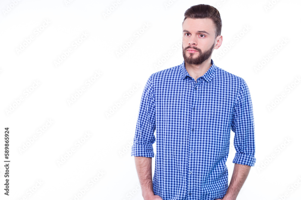 Strong, confident, handsome and bearded man in casual checkered shirt is posing isolated on white background with copy space for text and advertising Strong, confident, handsome and bearded man in casual checkered shirt is posing isolated on white background with copy space for text and advertising