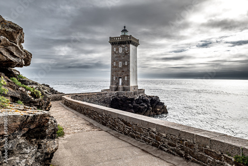 Lighthouse Phare De Kermorvan At Village Le Conquet At The Finistere Atlantic Coast In Brittany, France photo