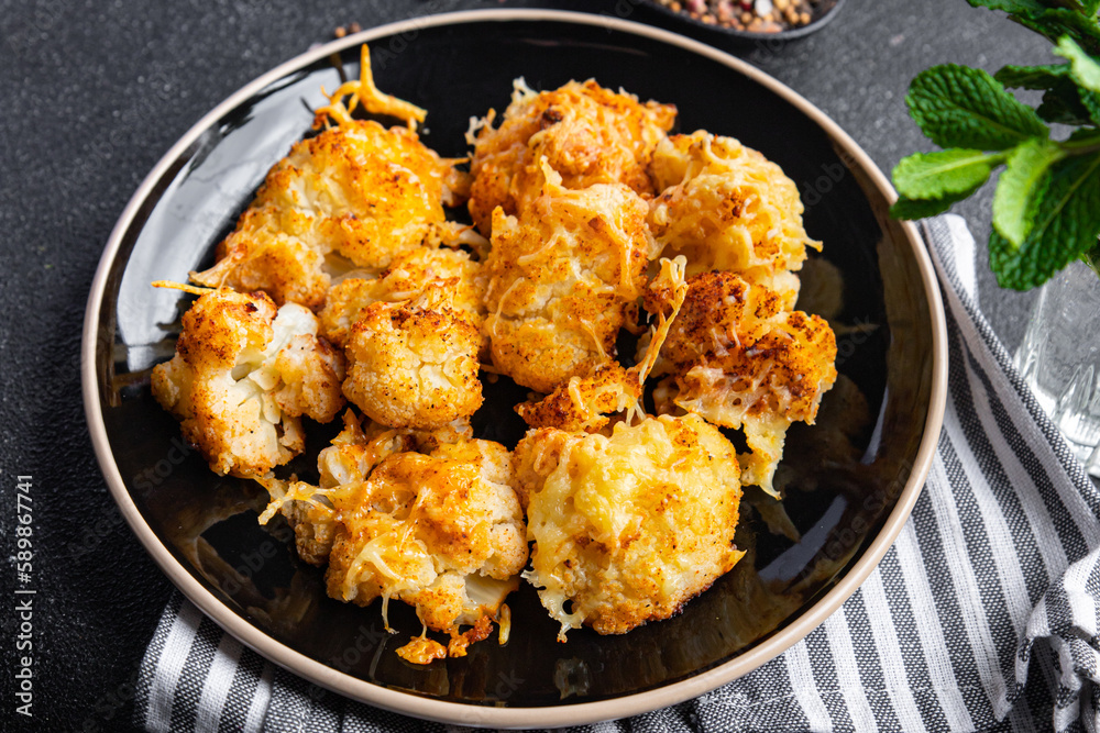 cauliflower with cheese baked vegetable meal food snack on the table copy space food background rustic top view cauliflower with cheese baked vegetable meal food snack on the table copy space food background rustic top view