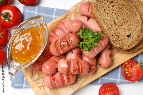 Concept of tasty food, grilled mini sausage, top view