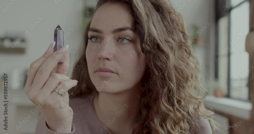 Pretty Young Adult Female Looking at Healing Crystal Pretty Young Adult Female Looking at Healing Crystal