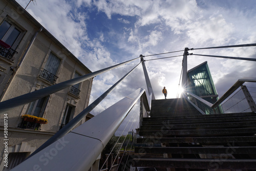 Tablou canvas Staircase and lift of the Müller footbridge in Paris suburb