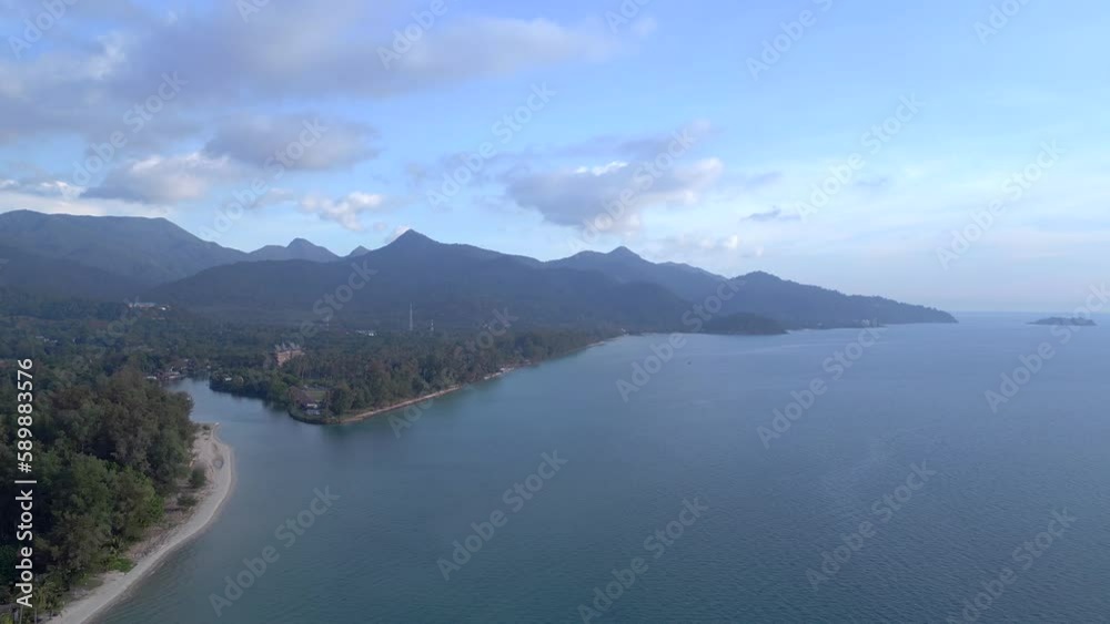 River flowing into sea, clouds mountains island. Smooth aerial view flight drone River flowing into sea, clouds mountains island. Smooth aerial view flight drone