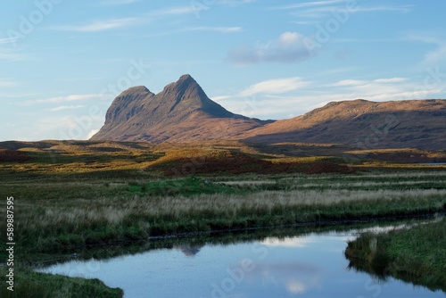 Stac Pollaidh in the Scottish highlands at sunset. 