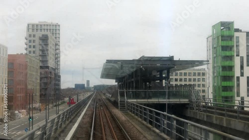 Copenhagen, Denmark A view out the  window from the driverless Copenhagen Metro moving on the Vestamager M1 green line. photo