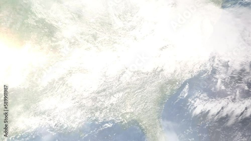 Earth zoom in from outer space to city. Zooming on Dalton, Georgia, USA. The animation continues by zoom out through clouds and atmosphere into space. Images from NASA photo