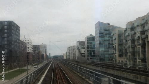 Copenhagen, Denmark A view out the  window from the driverless Copenhagen Metro moving on the Vestamager M1 green line. photo