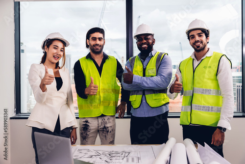 Team Engineers with draft plan of building on constructing site. Engineer work on site. engineer visit and inspection site engineer. Inspector engineer check and working on site.