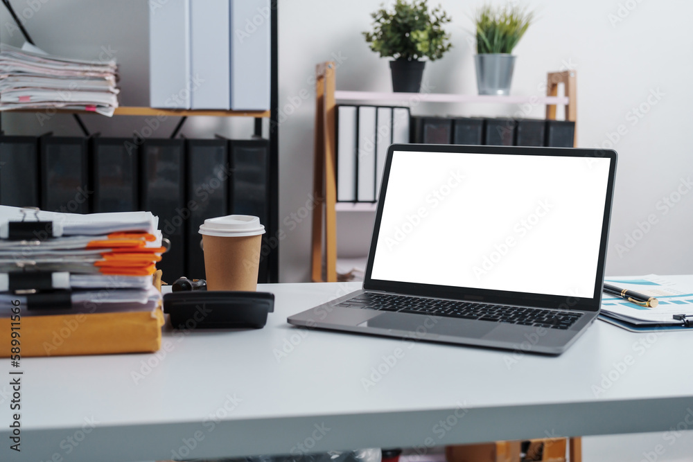 Fototapeta premium Stylish workspace with laptop, notebook, blank screen laptop on white table of bookkeeping.