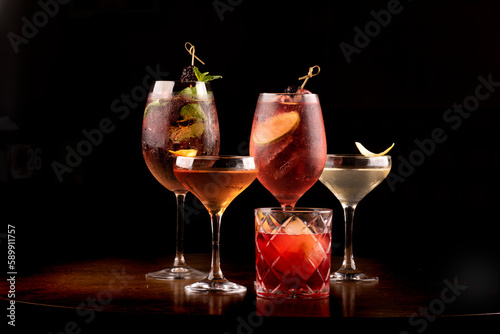 Photos collection of refreshing party cocktail glass of lillet spritz aperol with lemon