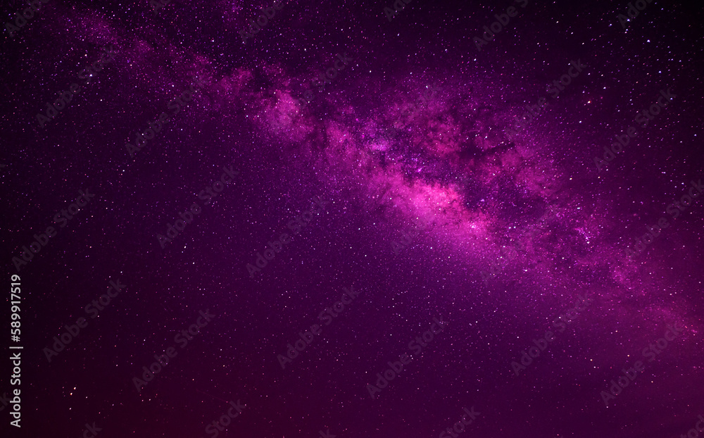 Violet,Pink, Purple night sky milky way and star on dark background.Universe filled with stars, nebula and galaxy with noise and grain.Photo by long exposure and select white balance.