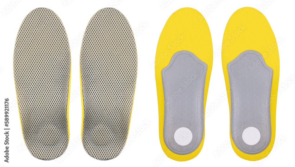 Yellow profiled shoe insoles seen from both sides Yellow profiled shoe insoles seen from both sides