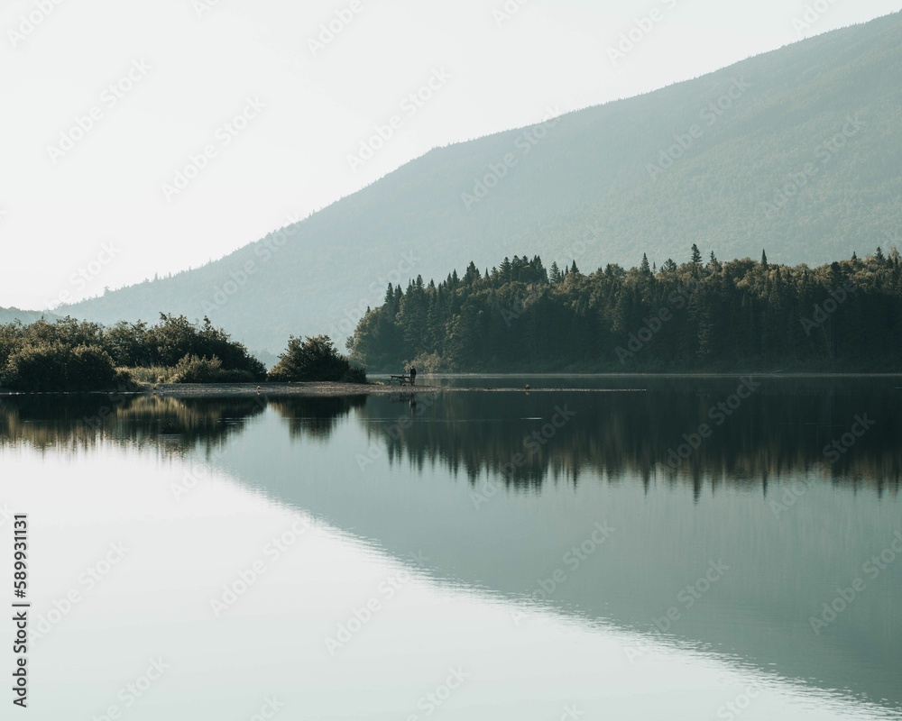 Beautiful view of a mountain with a lake in the foreground in New Brunswick, Canada