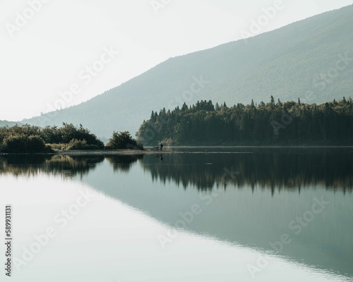 Beautiful view of a mountain with a lake in the foreground in New Brunswick, Canada