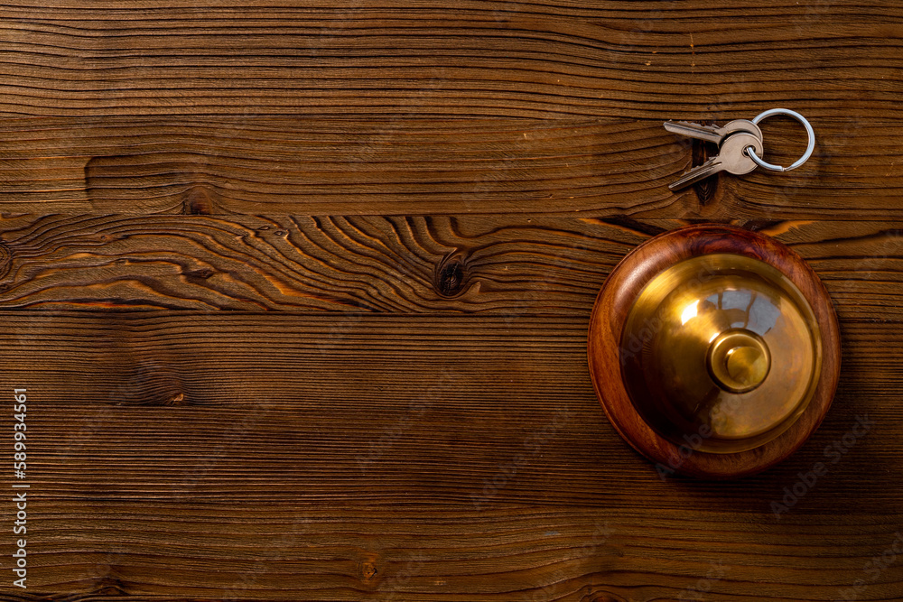 Hotel service bell with keys. Booking and checkin concept