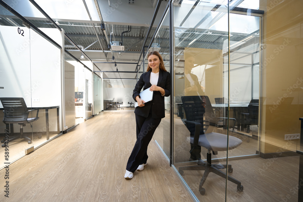 Portrait of beautiful business lady in coworking