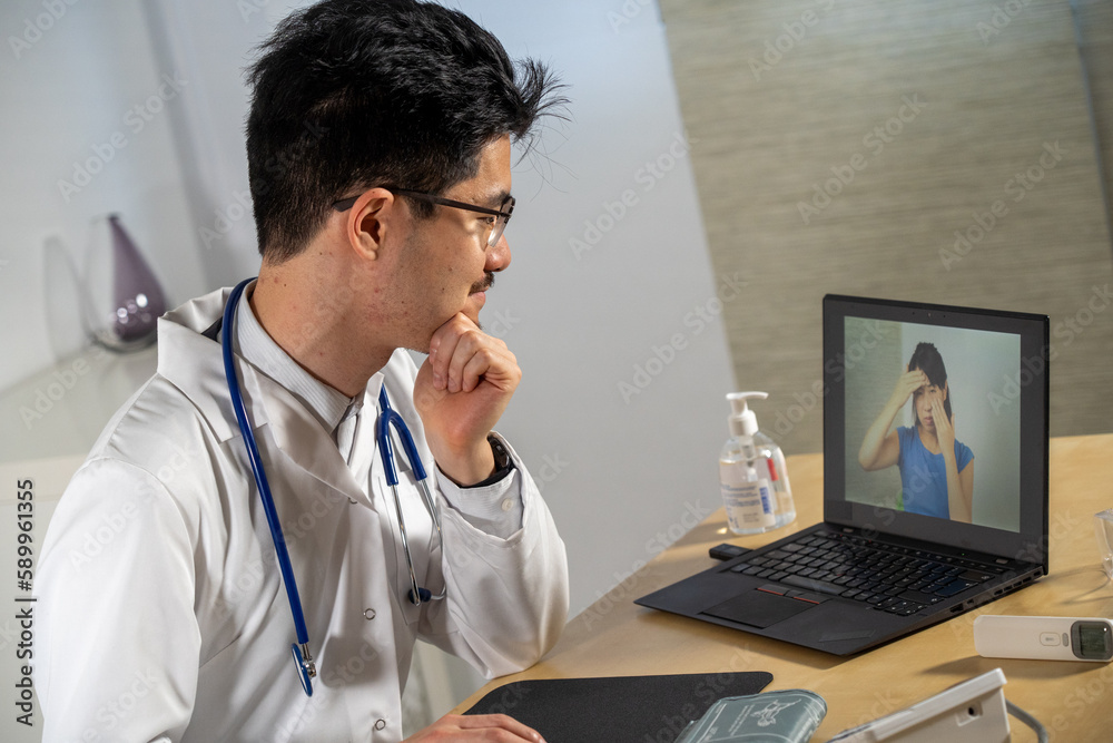 Doctor in remote consultation with 30 year old female patient with sinus pain. Doctor in remote consultation with 30 year old female patient with sinus pain.