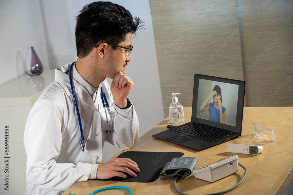 Doctor in remote consultation with 30 year old female patient with sinus pain. Doctor in remote consultation with 30 year old female patient with sinus pain.