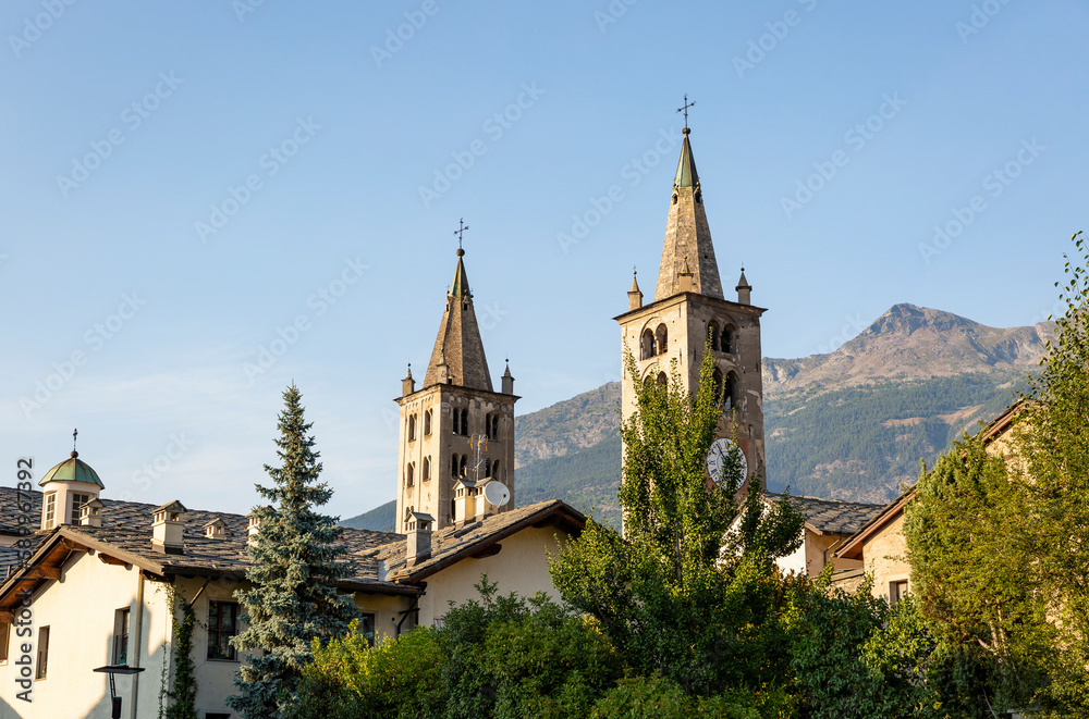 the two towers of the Santa Maria Assunta Cathedral in Aosta city, Aosta Valley, Italy