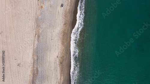 sean and sand on the beach from sky
