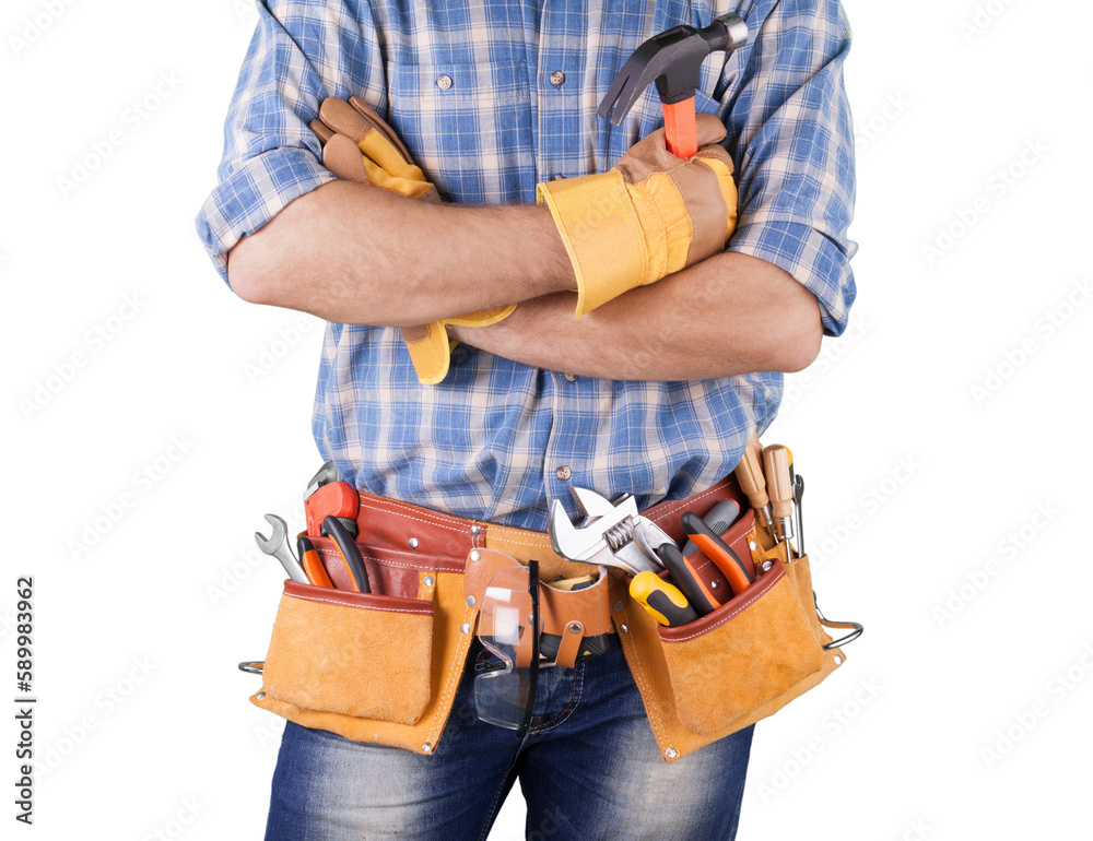 Young man worker in uniform with yellow belt and tools