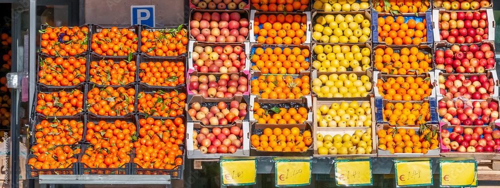 Banner view of crates full of fruit for sale in a town shop, Pontedera, Italy