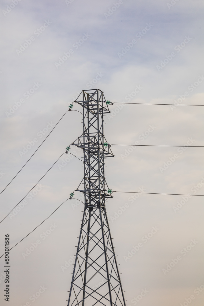metal tower power lines outside the city metal tower power lines outside the city