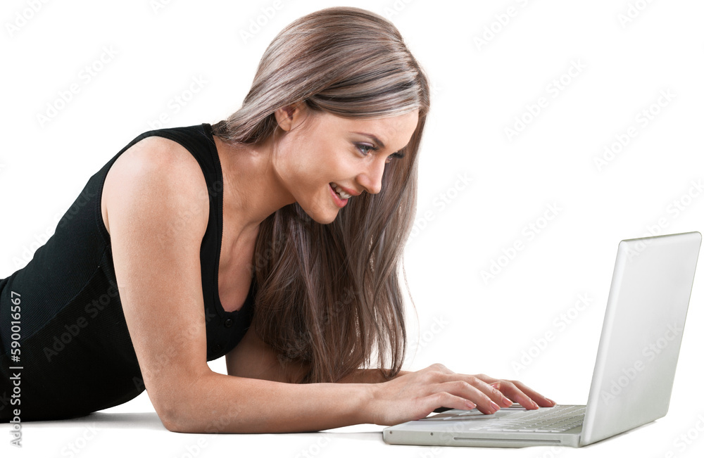 Smiling Woman Lying Down in Front of Her Laptop - Isolated Smiling Woman Lying Down in Front of Her Laptop - Isolated