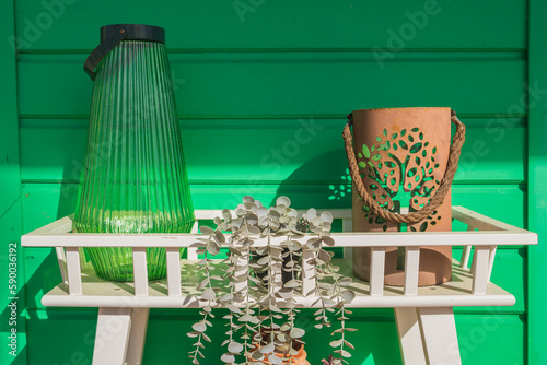 Spring time terrace decoration with a positive green color background.  photo