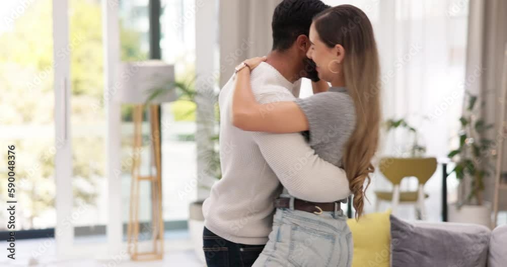 Love, dance and happy couple in living room with smile, romance and fun bonding time together. Dancing, celebrate and music, woman with man in apartment lounge for romantic celebration of anniversary