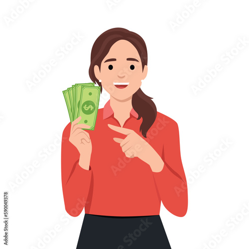 lucky girl hold lot of money, pointing at dollar bills in hand and smiling excitedly.