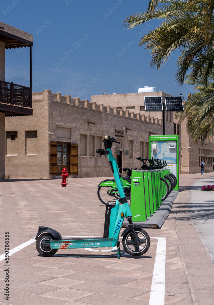Dubai, UAE 31 March 2023 Careem bike rental and Tier scooter in Al