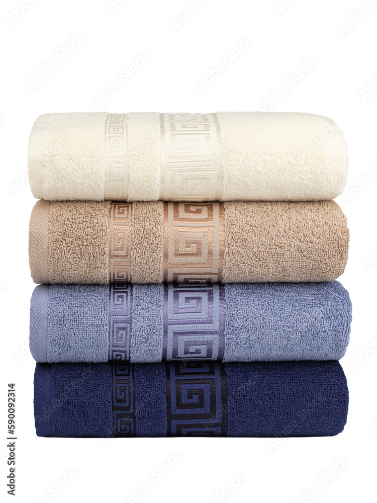 multicolored terry towels, rolled up and stacked on the table multicolored terry towels, rolled up and stacked on the table