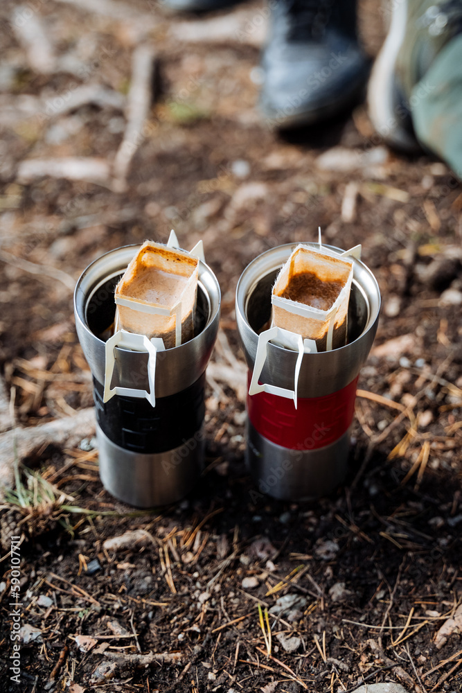 custom made wallpaper toronto digitalFilter a bag of coffee brewed in a glass, hike in the forest, brew coffee in nature, a quick drink, instant caffeine in a glass.