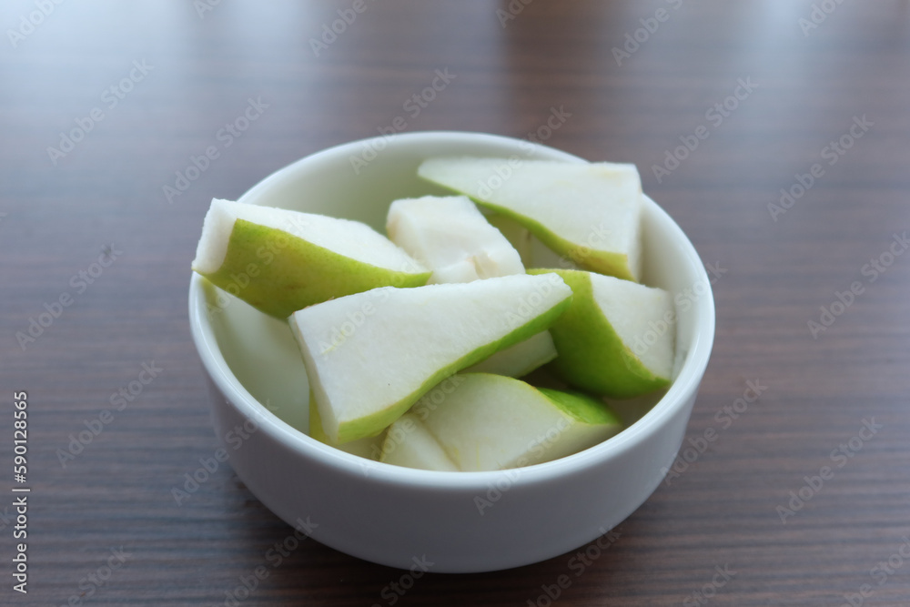 slice of fresh pears on table close up slice of fresh pears on table close up