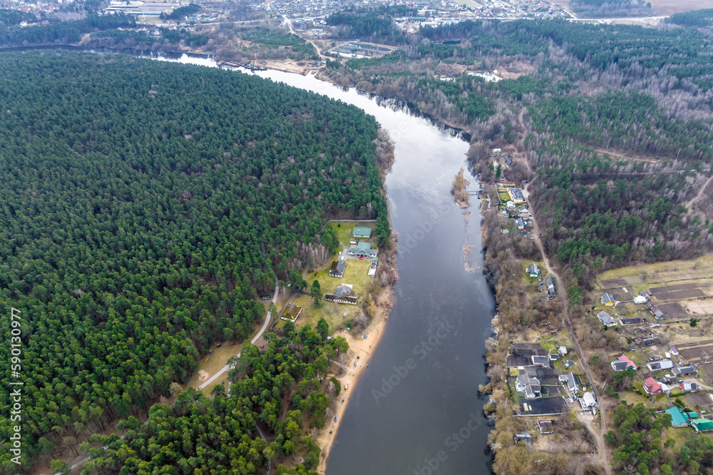 panoramic view from a high altitude of a meandering river in the forest