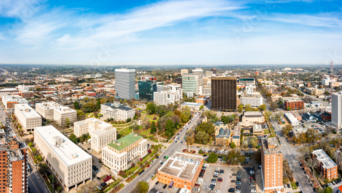 Drone panorama of the South Carolina Statehouse and Columbia skyline on a sunny morning. Columbia is the capital of the U.S. state of South Carolina and serves as the county seat of Richland County photo