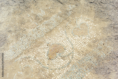 Mosaic on the floor in the ancient city of Perge. Ruins of the city of Perge in Turkey.