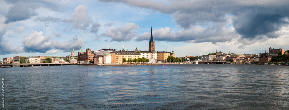 Stockholm, Sweden - Panorama of the waterfront with the historic center of Gamla Stan. Sea water and bridges in the city.
