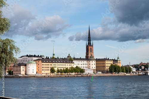 Canvas Print Stockholm, Sweden - Waterfront with buildings and historic part of Gamla Stan and church tower