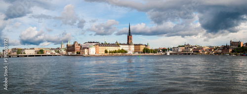 Stockholm, Sweden - Panorama of the waterfront with the historic center of Gamla Stan. Sea water and bridges in the city.