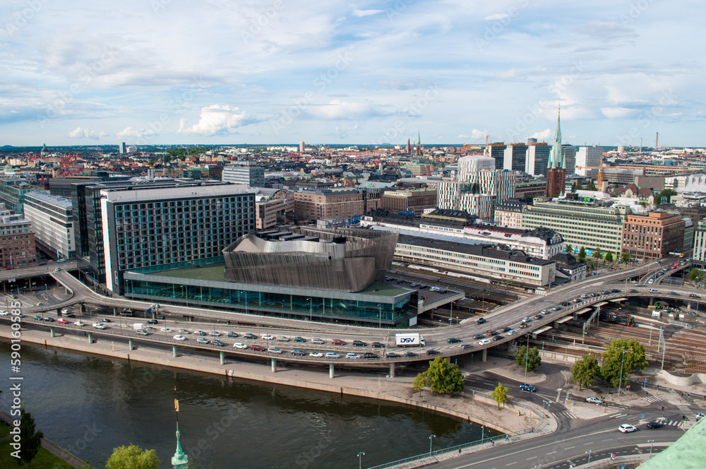 Stockholm, Sweden - Panorama of modern buildings in the city center. Bridges and highways on the embankment above the water.