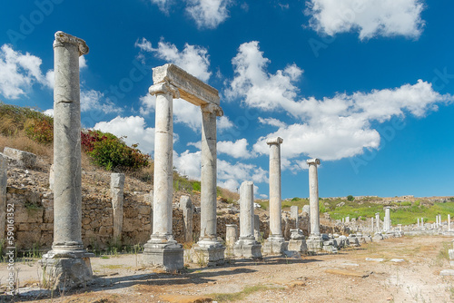 Street with columns in the ancient city of Perge. Ruins of the ancient city.