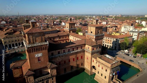 Ferrara - beautiful medieval town in Emilia Romagna, Italy. aerial drone video of castle Estense in historic center photo