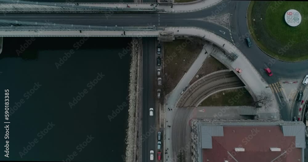 Topdown Aerial view of Budapest traffic during a cloudy day. Bridge over the Danube river Topdown Aerial view of Budapest traffic during a cloudy day. Bridge over the Danube river